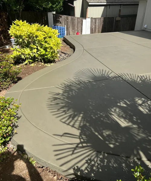 Broom finish patio and decorative borders in Covington 